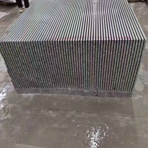 抚州芝麻白毛板荒料切割